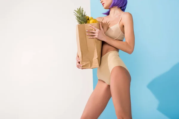 Cropped View Girl Underwear Holding Paper Bag Fruits Blue White — Stock Photo, Image