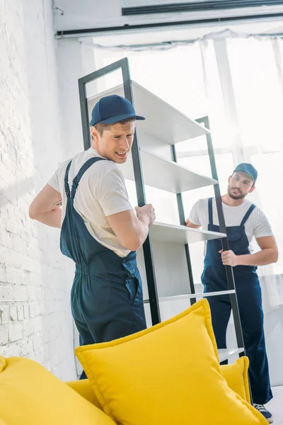 Two Movers Uniform Transporting Rack Apartment — Stock Photo, Image