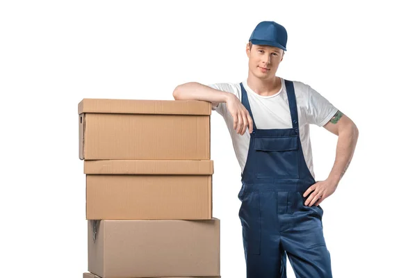 Handsome Mover Uniform Cardboard Boxes Looking Camera Isolated White — Stock Photo, Image
