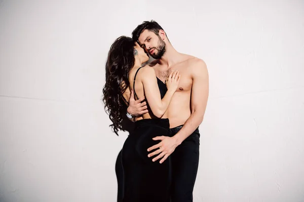 Sexy Brunette Woman Touching Muscular Handsome Man White — Stock Photo, Image