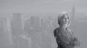 double exposure of attractive woman with crossed arms and new york cityscape 