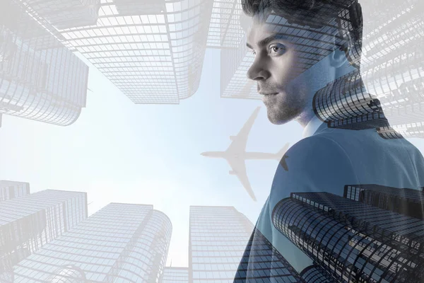 double exposure of confident businessman and skyscrapers with flying plane