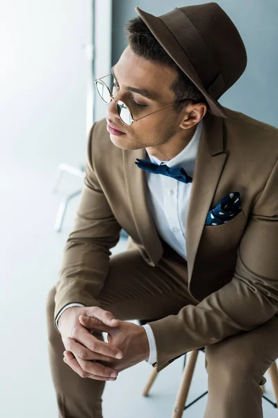 Stylish Mixed Race Man Suit Sunglasses Sitting Chair Folded Hands — Stock Photo, Image