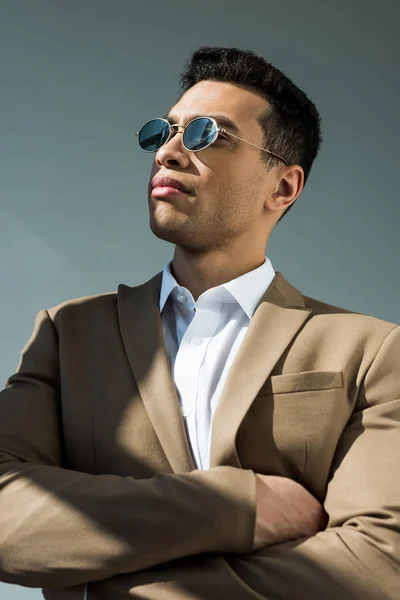 Stylish Mixed Race Man Suit Sunglasses Posing Crossed Arms Grey — Stock Photo, Image