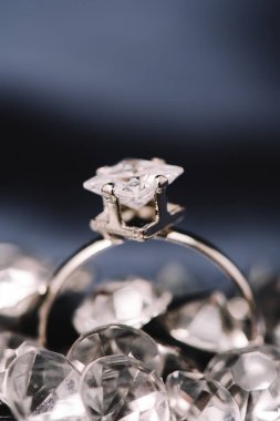 selective focus of engagement ring with shiny diamond  clipart