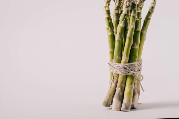 Bunch Green Fresh Asparagus Tied Rope Grey Background — Stock Photo, Image
