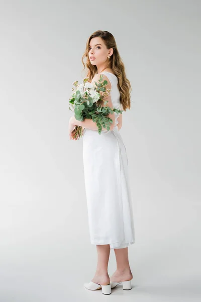 Young Woman White Dress Holding While Standing Grey — Stock Photo, Image