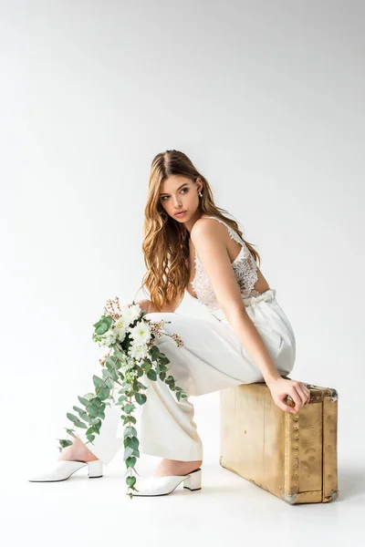 Attractive Girl Sitting Travel Bag Holding Bouquet Flowers Eucalyptus Leaves — Stock Photo, Image