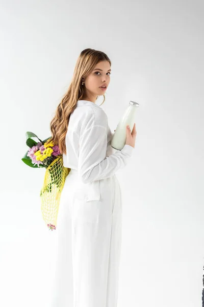 Beautiful Woman Holding Bottle Milk Yellow String Bag Wildflowers White — Stock Photo, Image