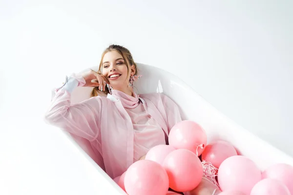 Happy Young Woman Lying Bathtub Pink Air Balloons White — Stock Photo, Image