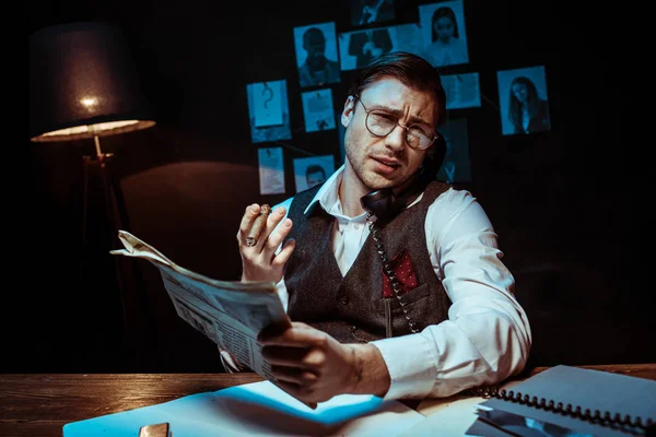 Concentrated Detective Glasses Holding Newspaper Talking Telephone — Stock Photo, Image