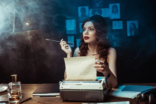 Pensive Woman Mouthpiece Using Typewriter Dark Office — Stock Photo, Image