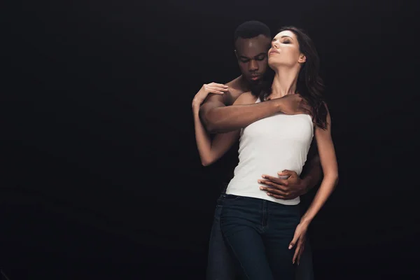 African American Man Embracing Attractive Woman Isolated Black Copy Space — Stock Photo, Image