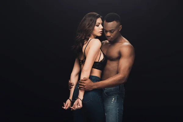 Shirtless African American Man Hugging Beautiful Sexy Woman Handcuffs Isolated — Stock Photo, Image