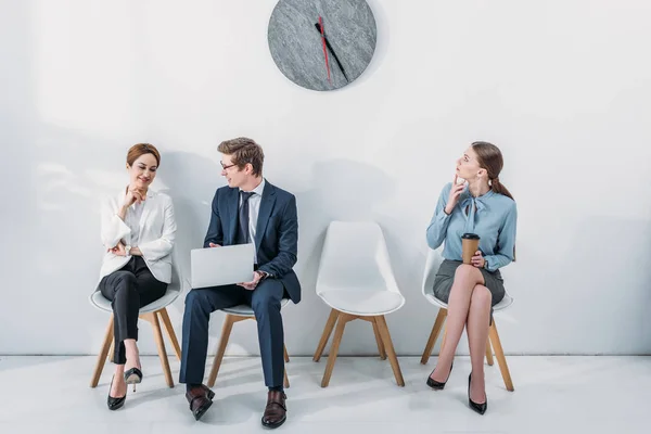 Woman Paper Cup Looking Clock Employees Sitting Chairs — Stock Photo, Image