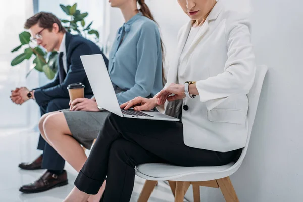 Cropped View Woman Looking Watch While Using Laptop — Stock Photo, Image