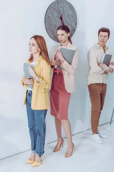 Worried Women Handsome Man Waiting Line Folders — Stock Photo, Image