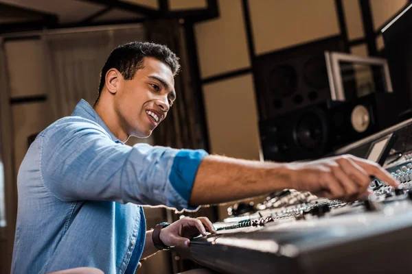 Selective Focus Smiling Mixed Race Sound Producer Working Mixing Console — Stock Photo, Image