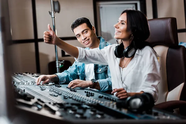 Selective Focus Cheerful Sound Produce Showing Thumb While Working Mixing — Stock Photo, Image