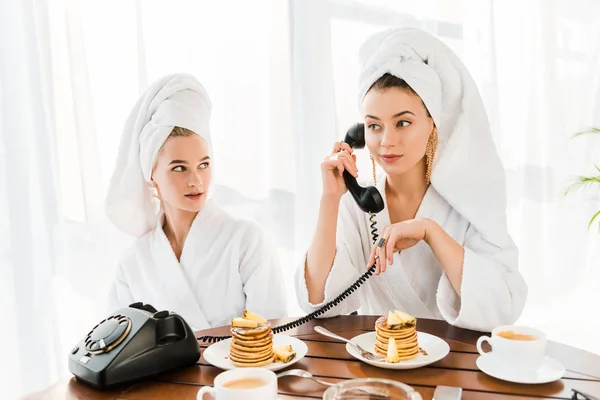 Stylish Women Bathrobes Jewelry Towels Heads Using Retro Telephone While — Stock Photo, Image