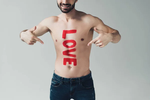 Cropped View Smiling Shirtless Man Pointing Fingers Inscription Body Isolated — Stock Photo, Image