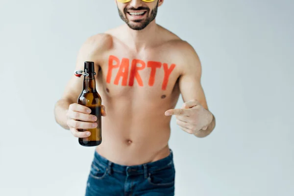 Cropped View Smiling Bearded Man Pointing Finger Beer Bottle Isolated — Stock Photo, Image