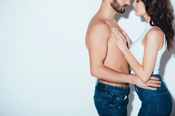 Cropped View Couple Jeans Embracing Grey — Stock Photo, Image