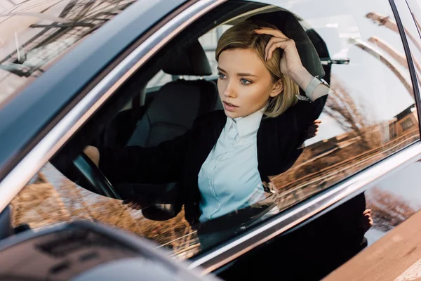 Beautiful Blonde Driver Holding Steering Wheel While Driving Car — Stock Photo, Image