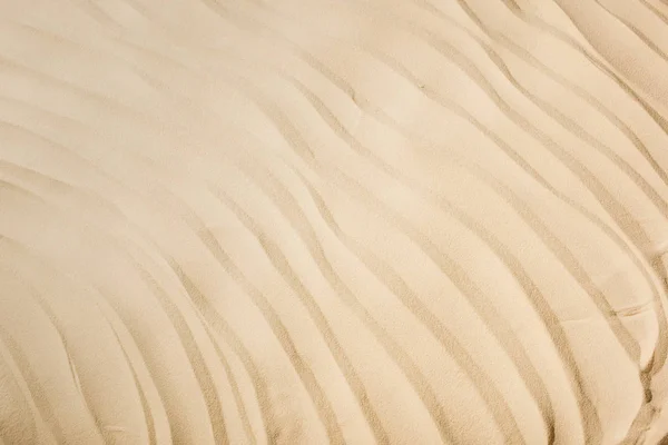 テクスチャ付き砂とコピースペースを持つ背景のトップビュー — ストック写真