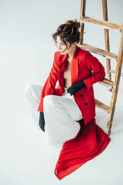 Overhead View Trendy Young Woman Sitting Wooden Ladder White — Stock Photo, Image