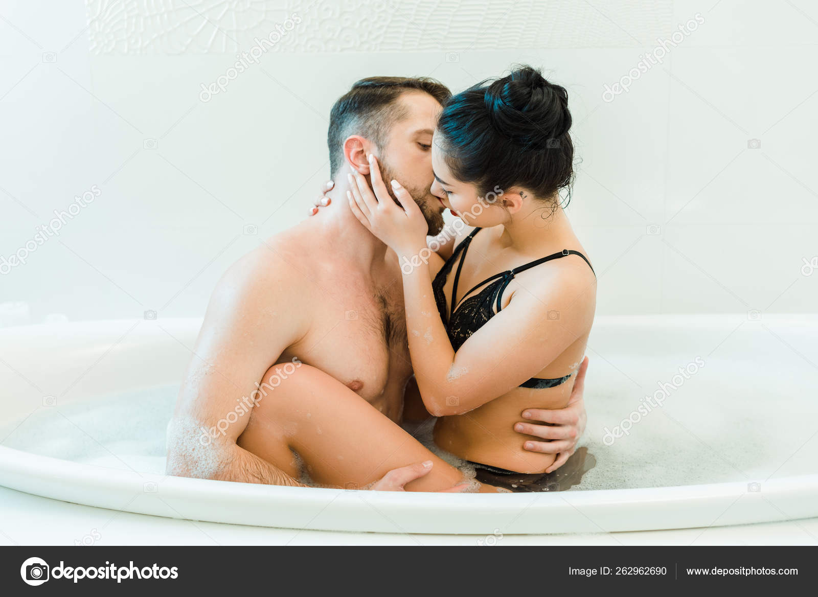 Attractive Sexy Woman Kissing Shirtless Men Bathtub Foam Stock Photo by  Â©VitalikRadko 262962690