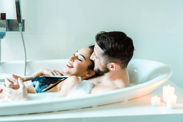 Happy Brunette Young Woman Lying Bearded Man Bathtub — Stock Photo, Image