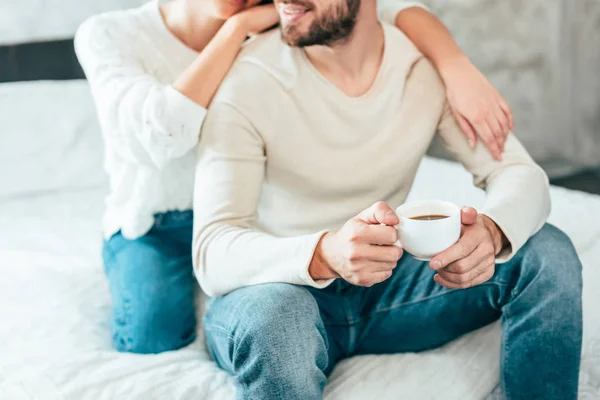Cropped View Woman Hugging Happy Man Holding Cup Coffee — Stock Photo, Image