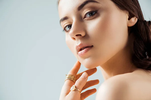 Young Naked Woman Shiny Makeup Golden Rings Touching Chin Looking — Stock Photo, Image