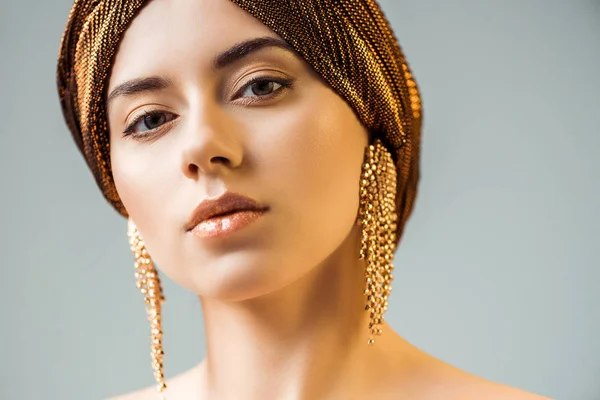 Young Stylish Woman Shiny Makeup Golden Earrings Turban Head Isolated — 스톡 사진