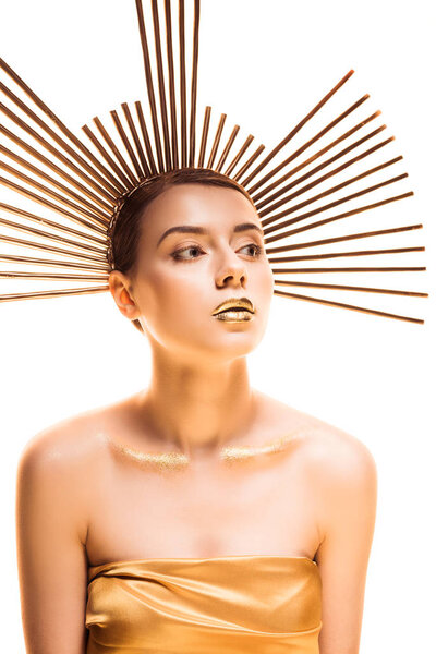 young attractive woman with golden makeup and accessory on head looking away isolated on white