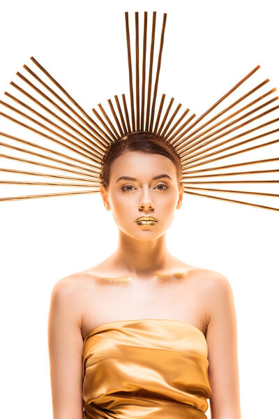 young attractive woman with golden makeup and accessory on head looking at camera isolated on white