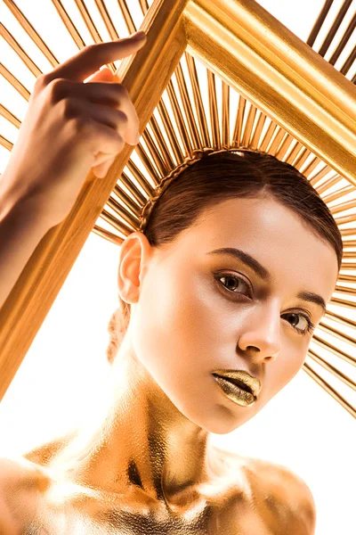 Beautiful Young Woman Painted Golden Accessory Head Looking Camera Holding — Stock Photo, Image