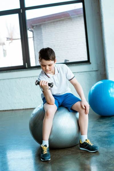 Cute Boy Sitting Fitness Ball Working Out Dumbbell Gym — Stock Photo, Image