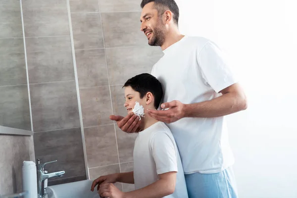 Father Applying Shaving Cream Face Son Bathroom — Stock Photo, Image