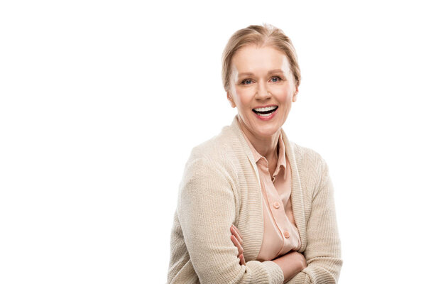 smiling middle aged woman with crossed arms Isolated On White with copy space