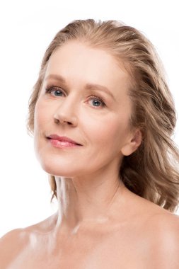 beautiful middle aged woman with clean face looking at camera Isolated On White 