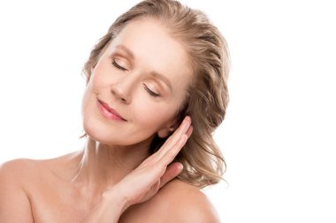 beautiful middle aged woman with clean face and eyes closed Isolated On White 