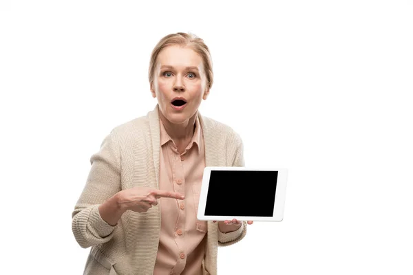 Surprised Middle Aged Woman Pointing Finger Digital Tablet Blank Screen — Stock Photo, Image