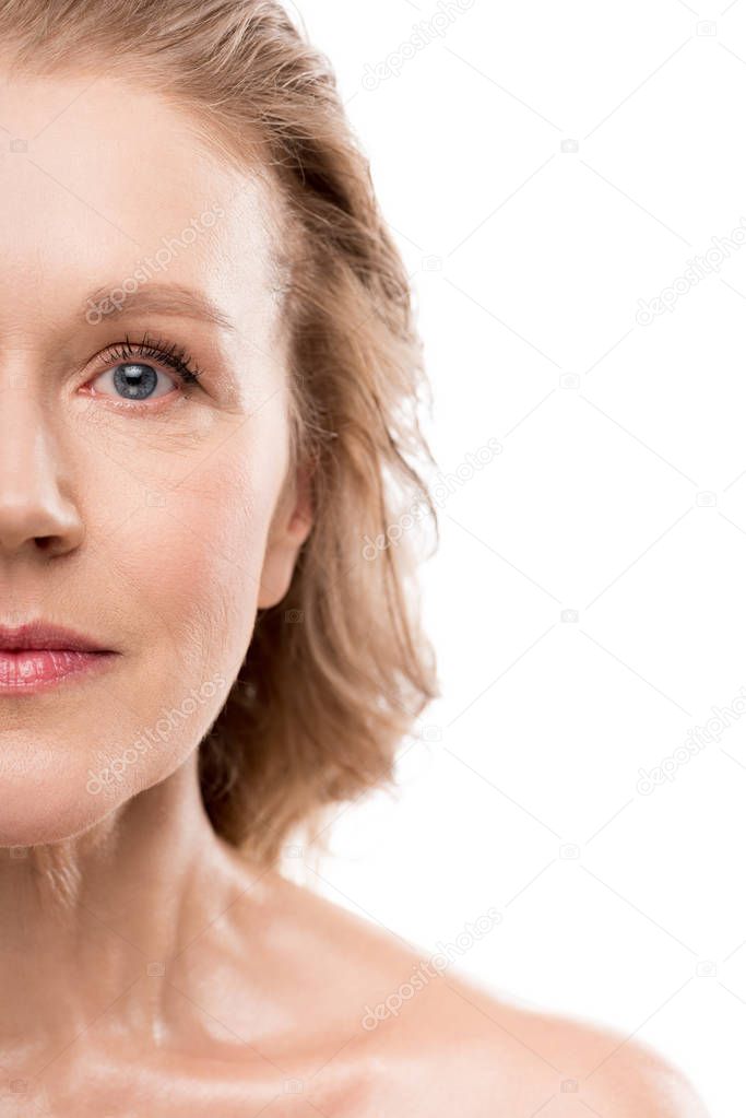 partial view of beautiful middle aged woman with clean face Isolated On White 