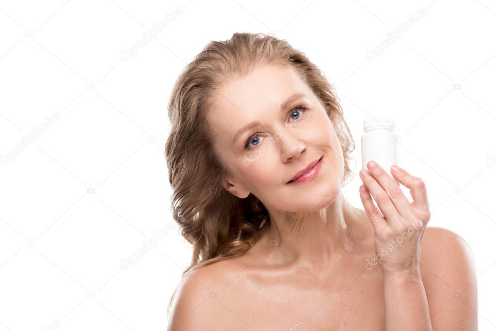 nude mature woman with bottle of medicine Isolated On White