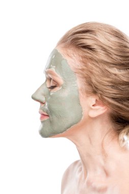 side view of mature woman with clay mask Isolated On White clipart