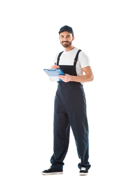 Smiling Delivery Man Writing Clipboard Looking Camera Isolated White — Stock Photo, Image