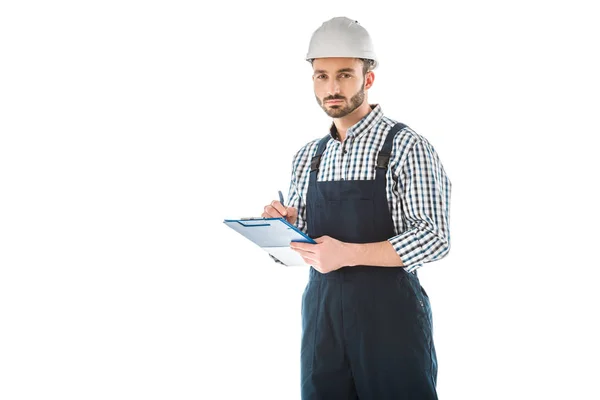 Serious Bearded Construction Worker Writing Clipboard Looking Camera Isolated White — Stock Photo, Image