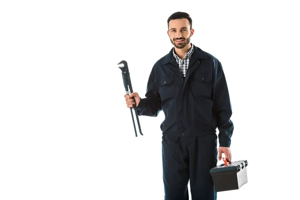 Cheerful Plumber Overalls Holding Adjustable Wrench Toolbox Isolated White — Stock Photo, Image
